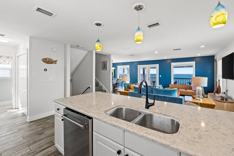 KITCHEN VIEW TO FAMILY ROOM