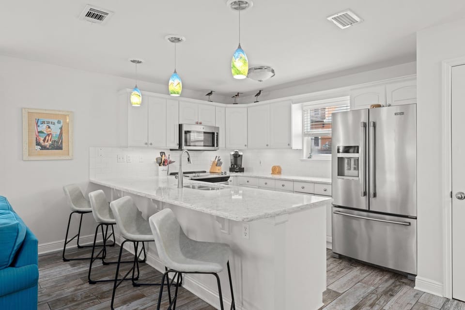 KITCHEN WITH BAR SEATING