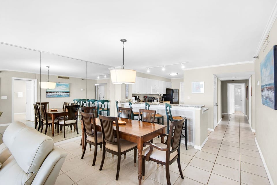 Your spacious open-concept dining and kitchen area features elegant seating for memorable meals together.