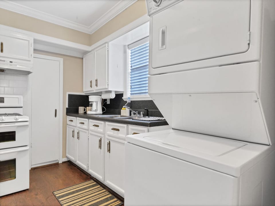 Full size kitchen w/ washer & dryer. Detergent is available as well. 
