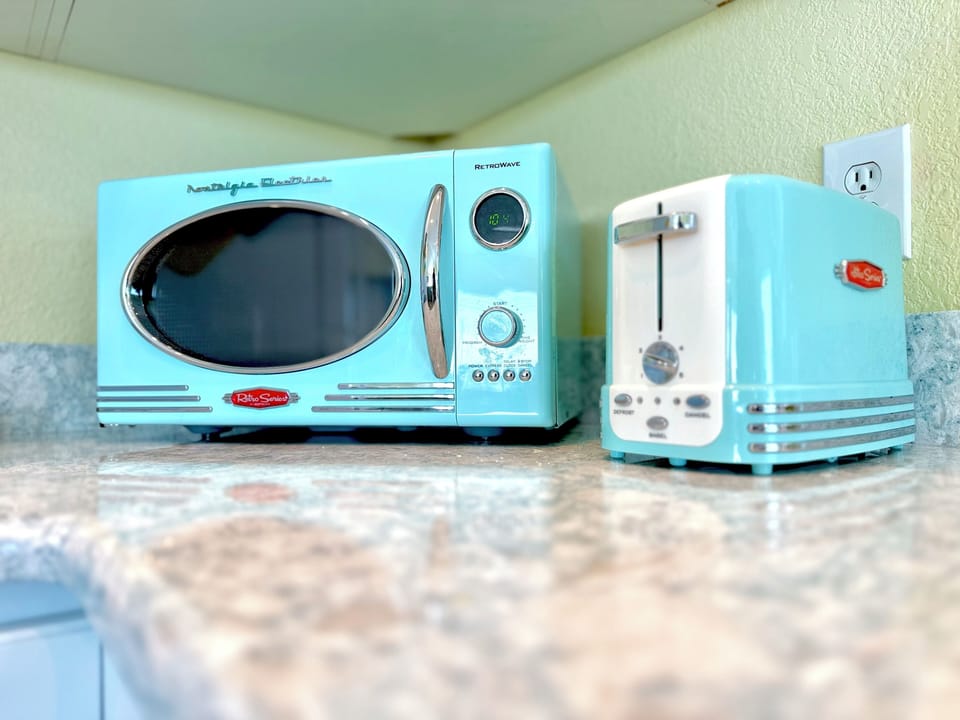 Fun and Functional Retro Vibe microwave and toaster.