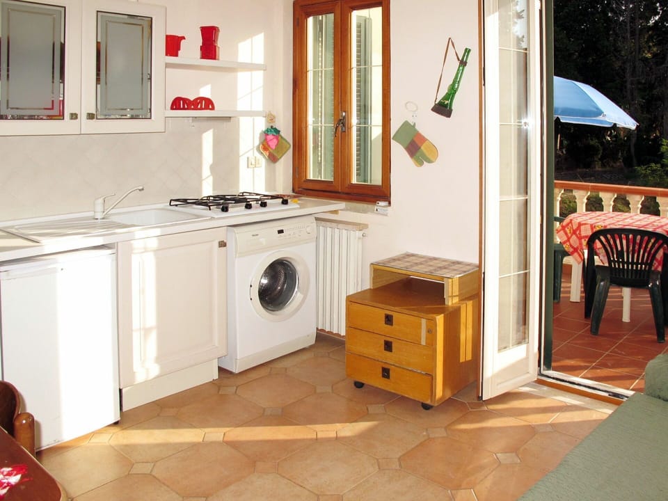 Room, Furniture, Kitchen, Cabinetry, Property, Floor, Major Appliance, Countertop, Interior Design, House
