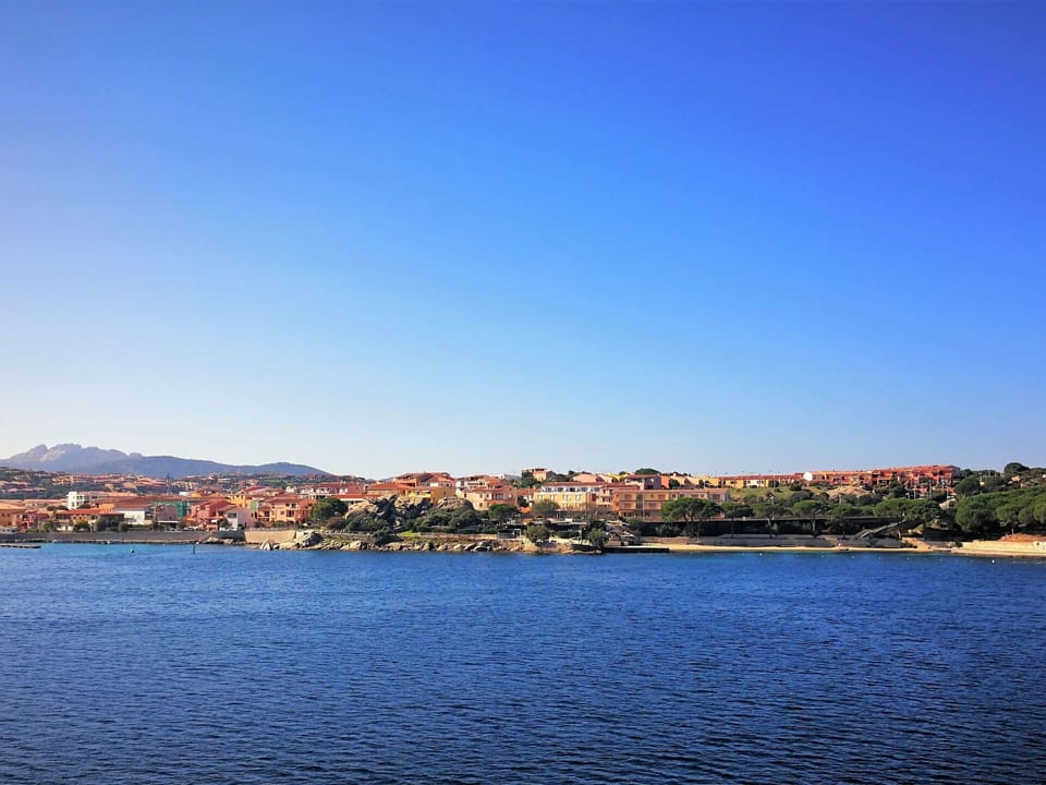 Water, Sky, Water Resources, Building, Cloud, Azure, Natural Landscape, Lake, Coastal And Oceanic Landforms, Bank