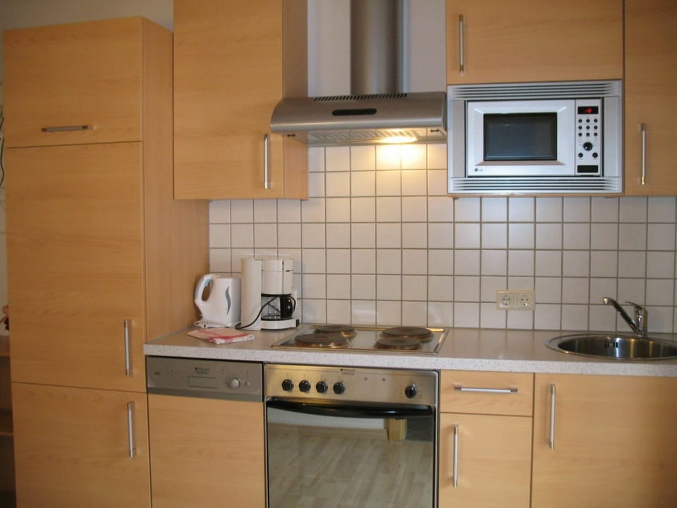 Countertop, Cabinetry, Kitchen Sink, Sink, Property, Kitchen Appliance, Kitchen Stove, Cooktop, Gas Stove, Kitchen