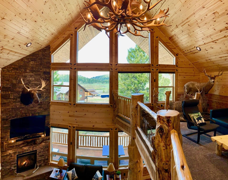 The huge windows put the gorgeous wilderness on display.