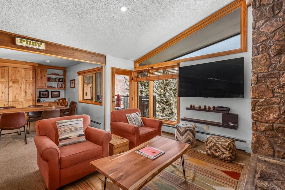 Relax in this living room after skiing or hiking in Snowmass