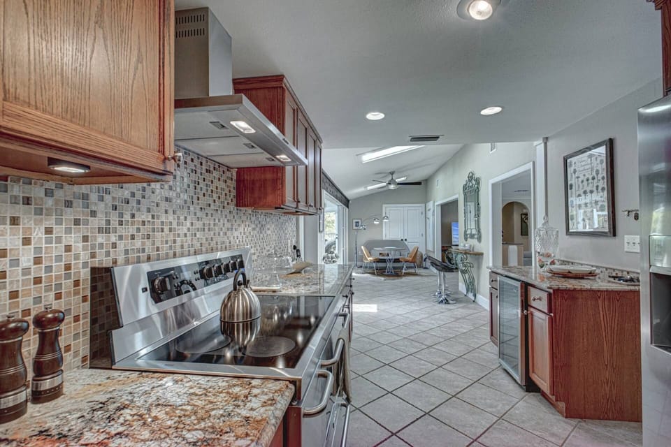Massive kitchen with plenty of room for a few cooks to whip up meals.  Wine refrigerator too!