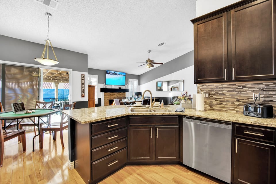 Chat with friends and family or watch the 65" SmartTV while preparing dinner