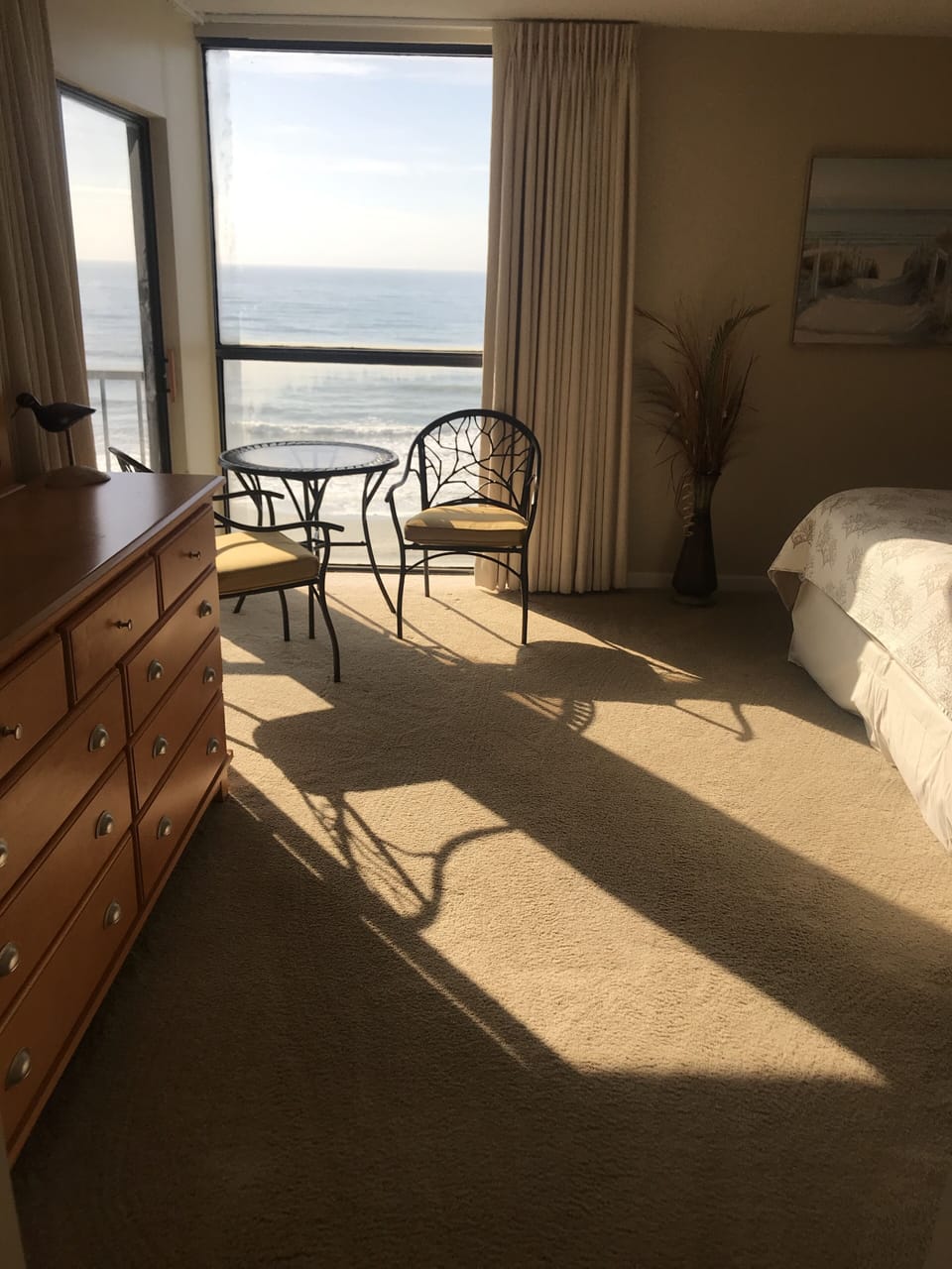 master bedroom with private access to balcony