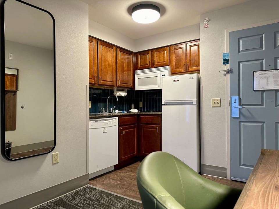Well-equipped kitchen with appliances and full cabinetry.