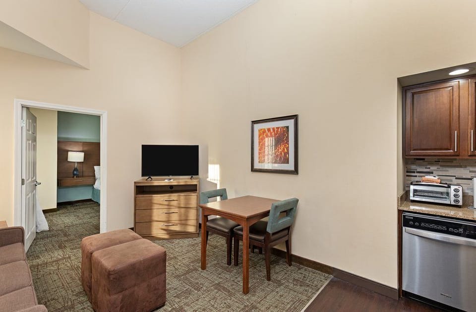 Open-concept layout connects the living area and kitchen.