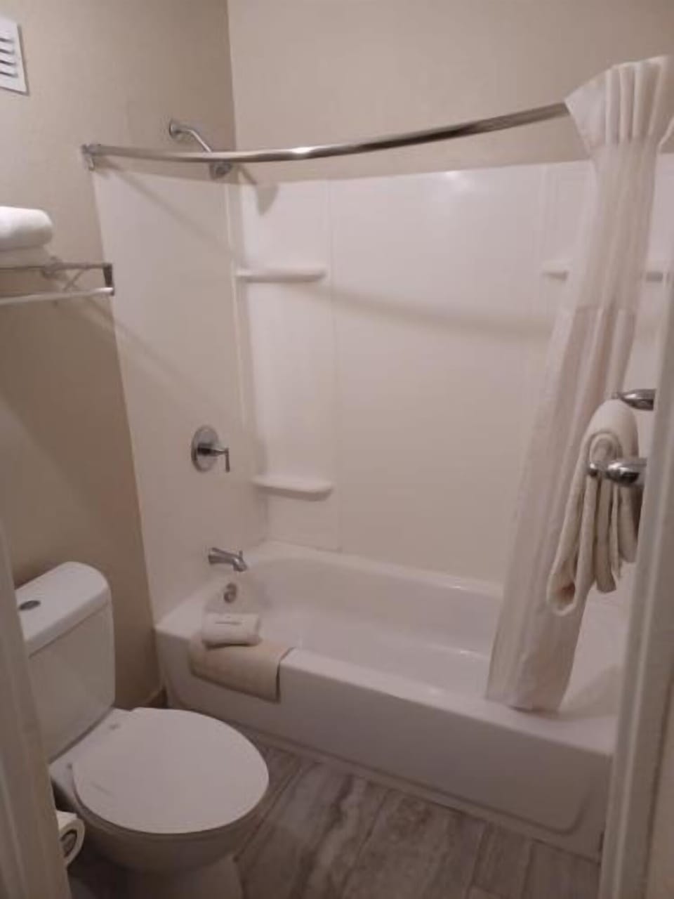 Soak and reset in a clean tub-shower combination.