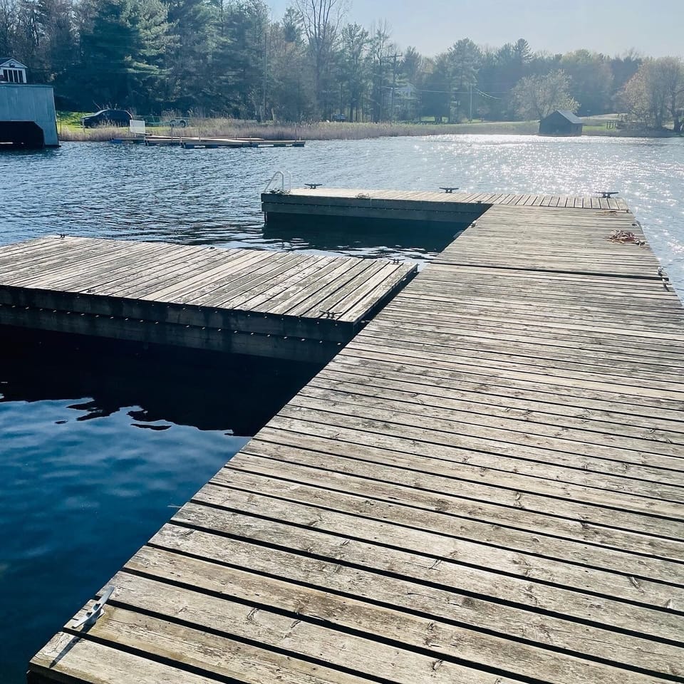 West dock for our seasonal boat slips and guests swim. The water depth at our West dock is about 11’ deep. Jump in and enjoy! 