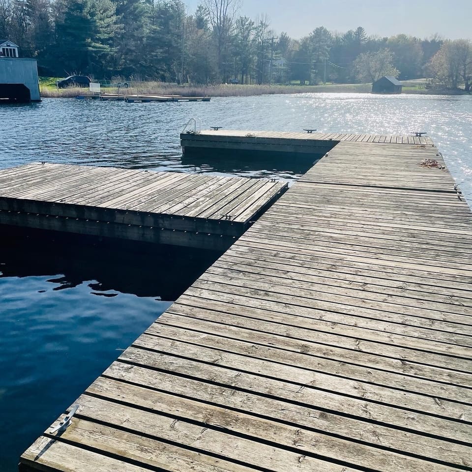 West dock for our seasonal boat slips and guests swim. The water depth at our West dock is about 11’ deep. Jump in and enjoy! 