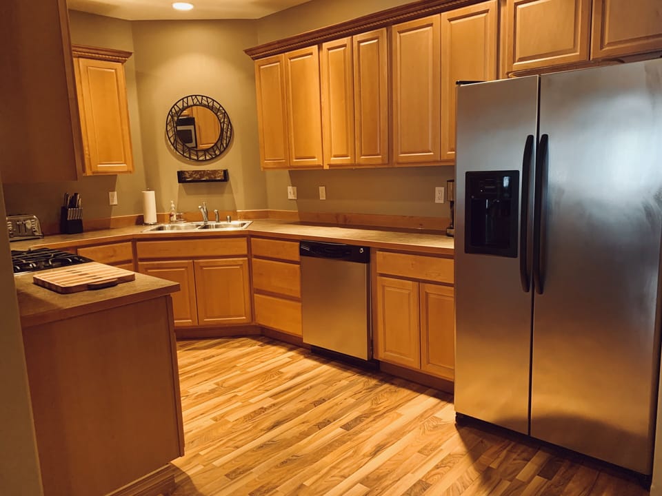 Spacious kitchen with full amenities, dishes, and  appliances