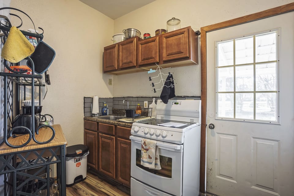 kitchen showing stove and sink