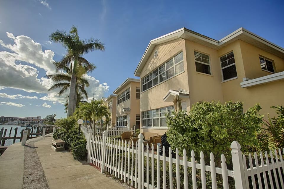Arrive to a palm-lined retreat with bright coastal charm.