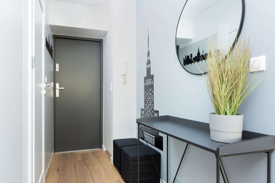 The living area's modern and stylish decor creates a welcoming atmosphere. 