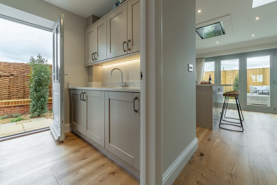 Ground floor: Side entrance with utility