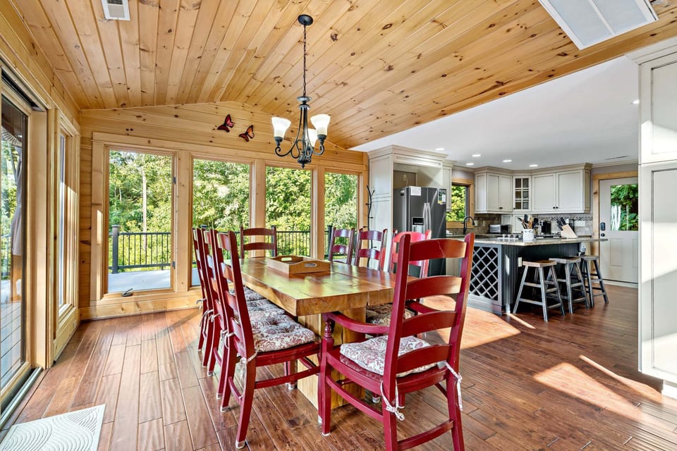 Dine in style with a table that seats 8 and big windows framing stunning mountain views.