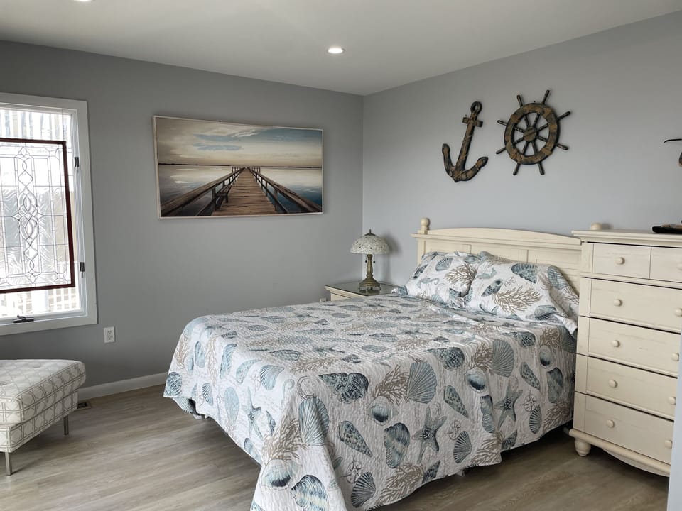 Bedroom 5: Queen Bed and Deck Overlooking the Bay