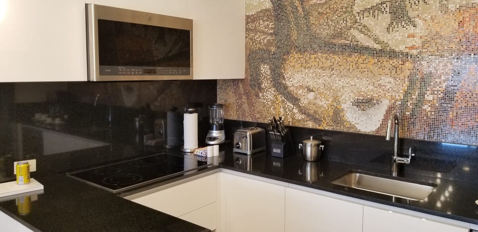 Full kitchen with stove, microwave, dishwasher, refrigerator and all appliances