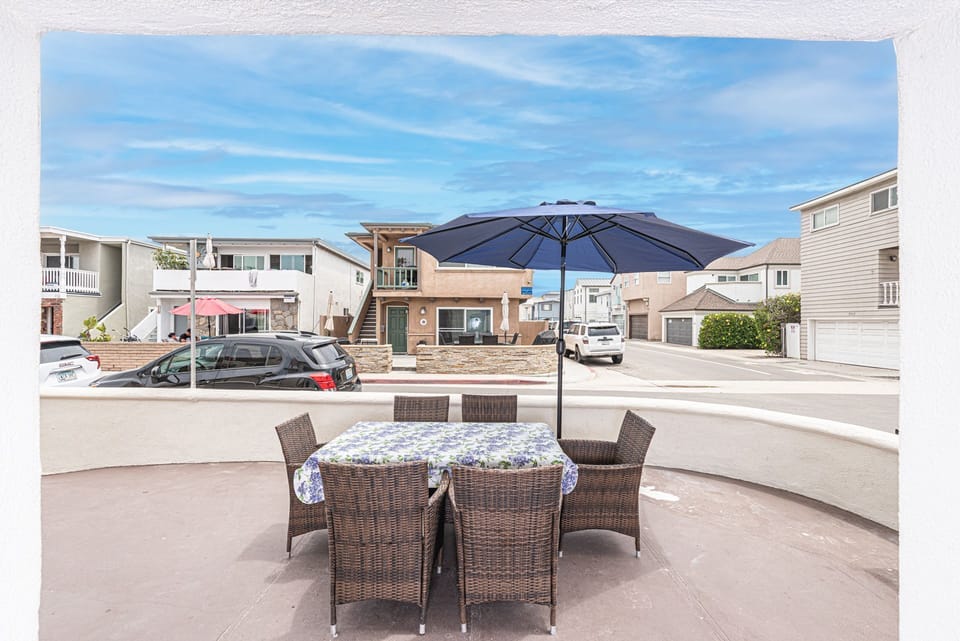Ocean view from the coveted corner front patio, one house back from beachfront.
                
