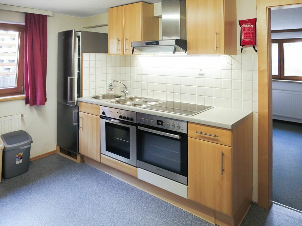 Cabinetry, Countertop, Kitchen Sink, Property, Sink, Tap, Kitchen Appliance, Kitchen Stove, Plumbing Fixture, Window