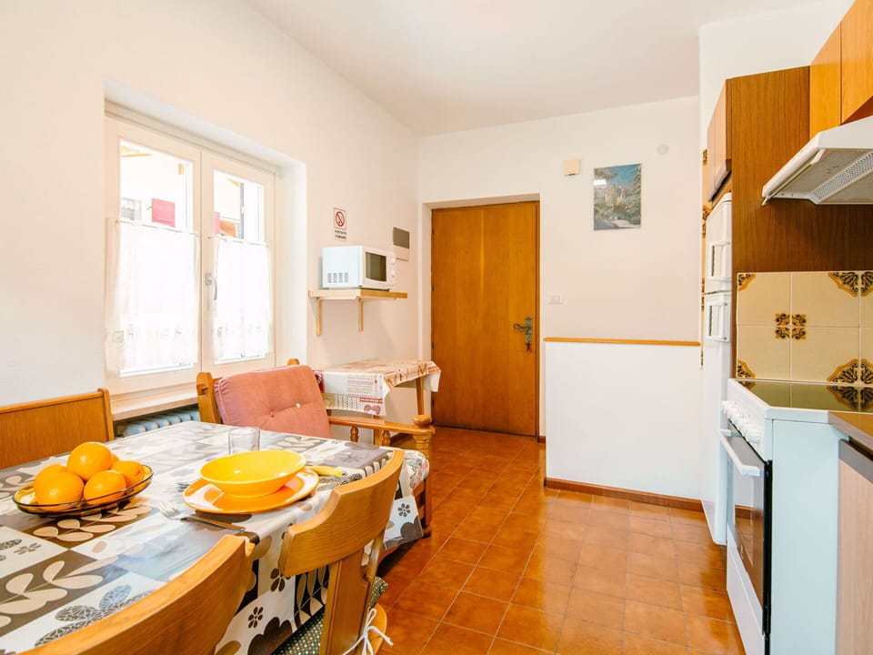 Table, Property, Furniture, Cabinetry, Wood, Chair, Orange, Interior Design, Building, Door