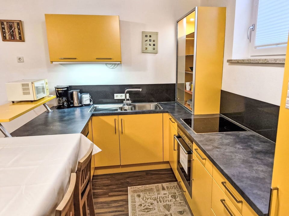 Furniture, Chair, Table, Apartment, Outdoor Furniture, Balcony, Kitchen & Dining Room Table, Condominium, Shade, Patio
