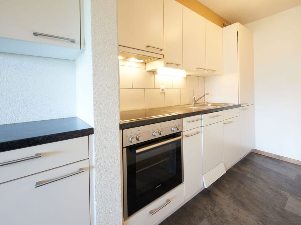 Cabinetry, Countertop, Property, Building, Kitchen Stove, Kitchen Appliance, Kitchen, Tap, Sink, Wood
