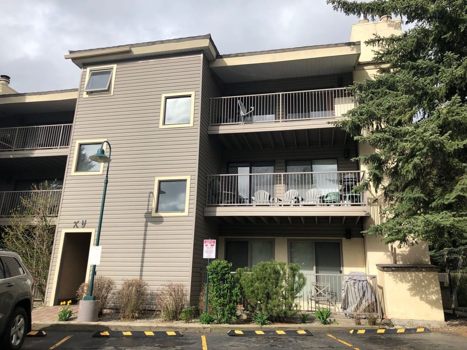 Condo is on the 2nd floor via stairs. Great natural light due to end location. 