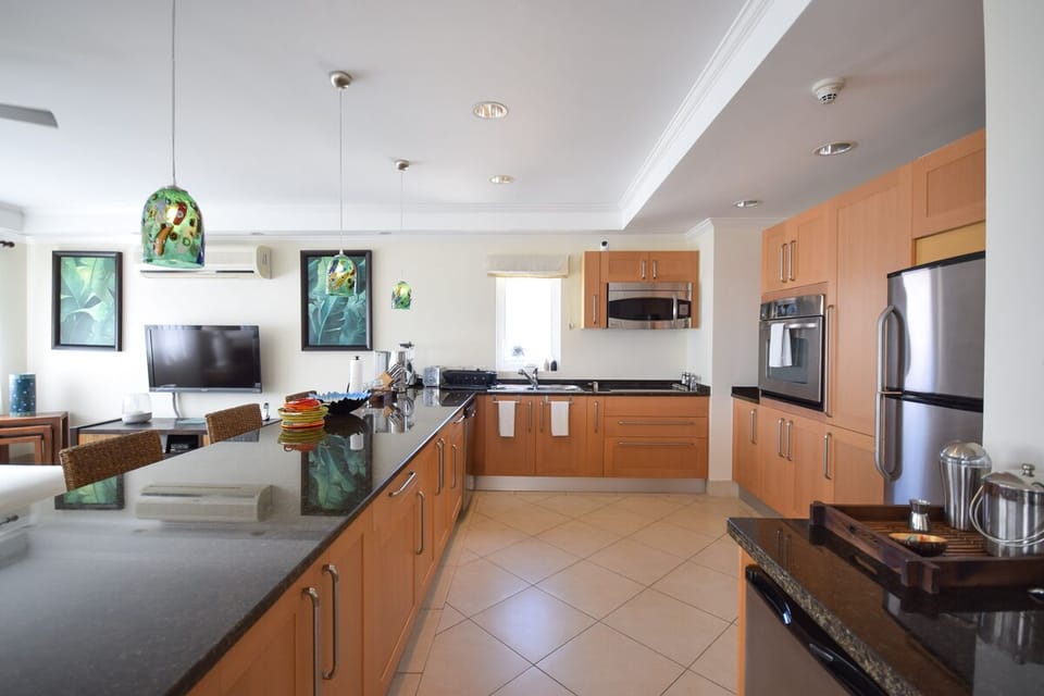 Fully outfitted modern kitchen. Ask our concierge about pre-delivering groceries!
