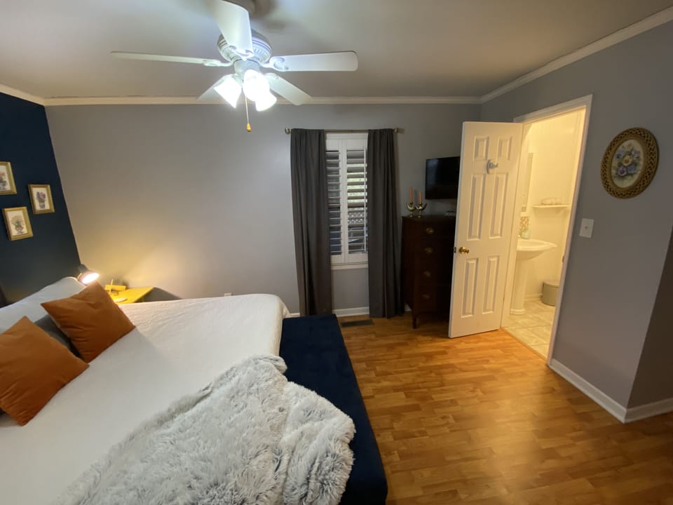 1/2 bath attached to Bedroom 1 downstairs.