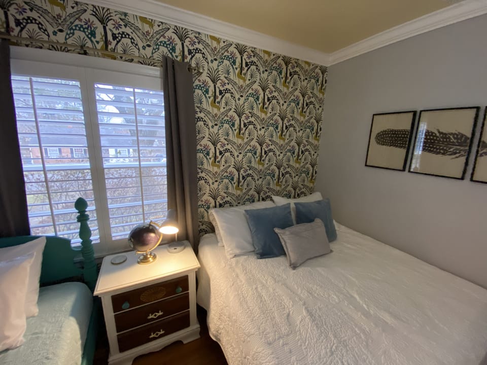 A fun, funky wallpaper was the perfect addition to this bedroom update!