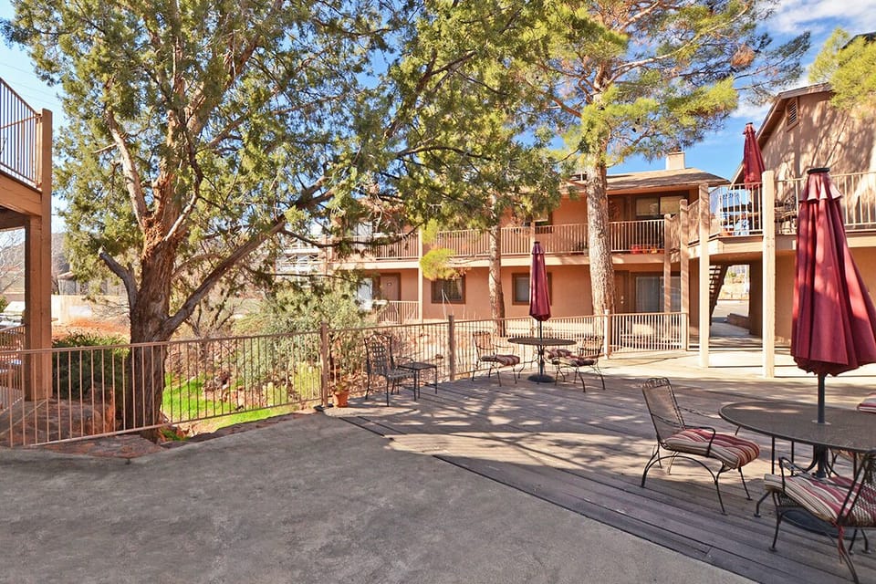 Relax at the many tables, chairs, grilling areas & gazebo