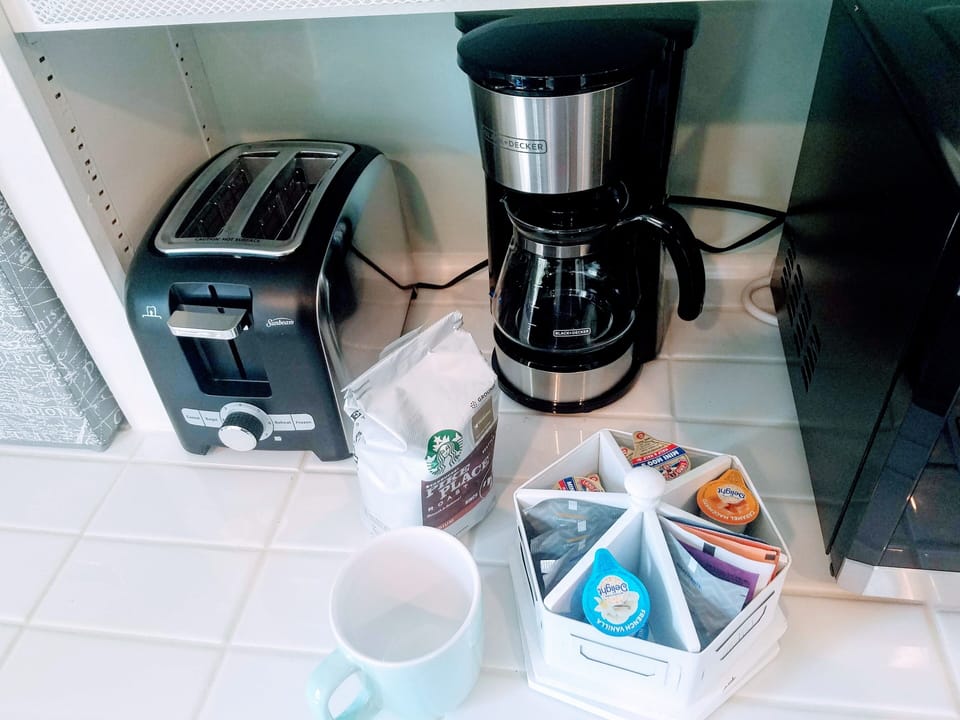 Toaster, drip coffeemaker with permanent filter, coffee, creamers, & teas