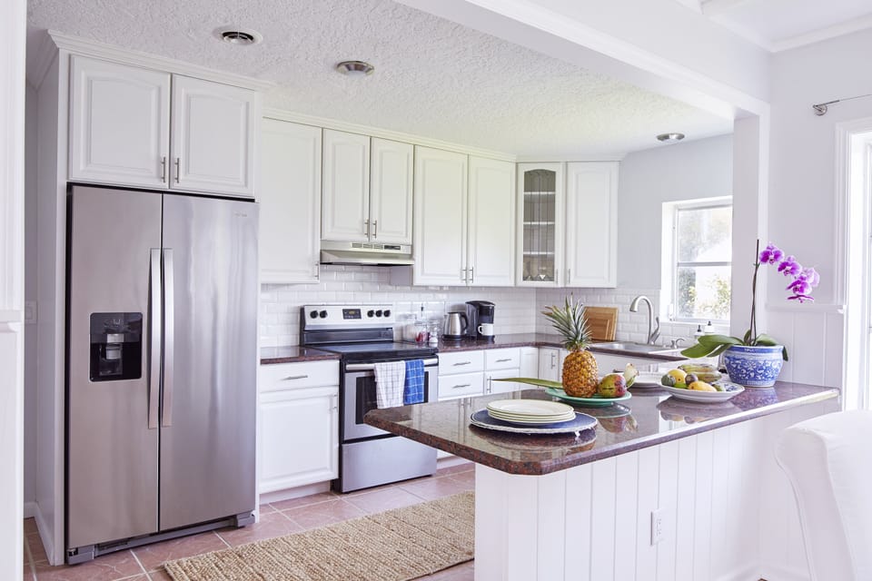 spacious kitchen open to dining area
