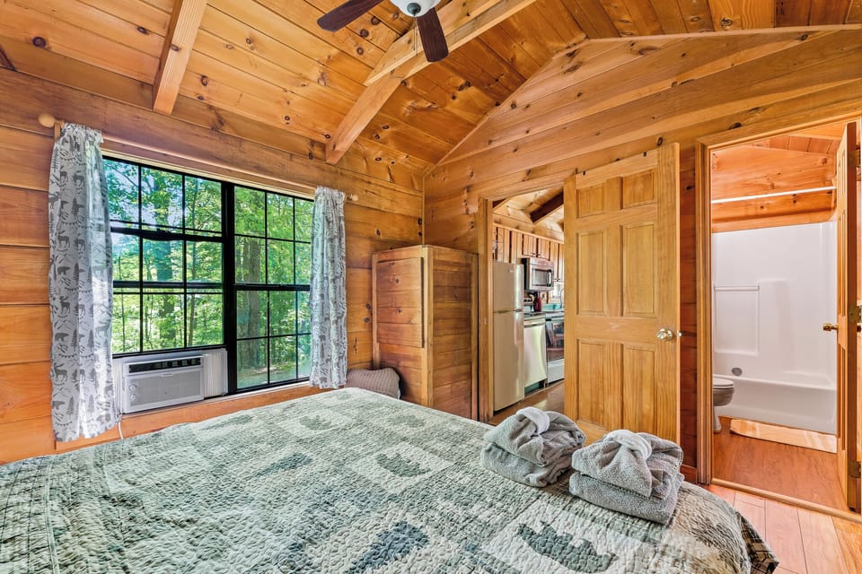 Classic cabin style with soft sheets, fresh air, and all the comforts of home.