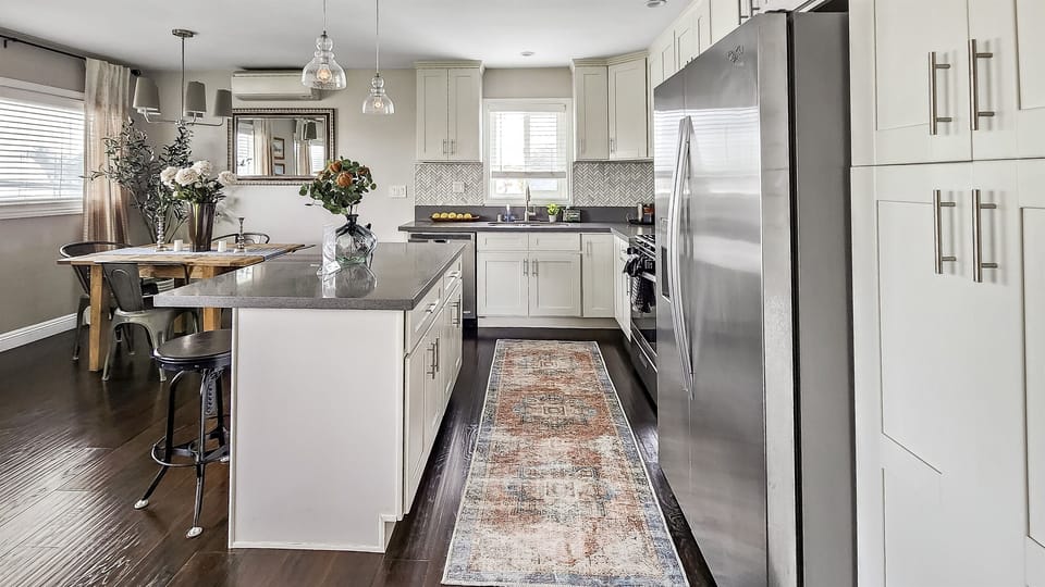 Chefs kitchen with gas stove and island. Fully stocked with all the necessary cookware and utensils. Also complimentary coffee, with sugar and creamer. French press plus drip coffee machine.