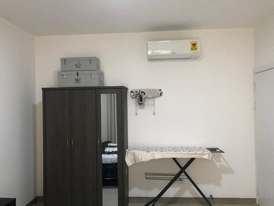 Wardrobe and ironing board