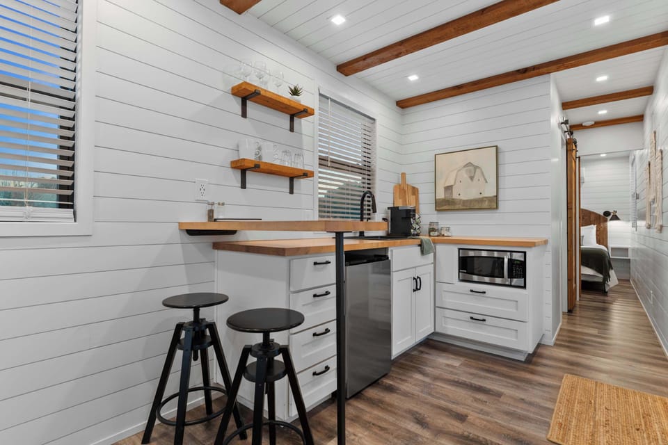 At the kitchenette there is a sitting bar and two barstools, and you'll always have coffee provided for your stay.