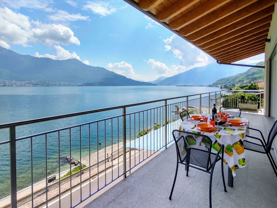 Cloud, Water, Sky, Table, Furniture, Property, Building, Chair, Mountain, Fence
