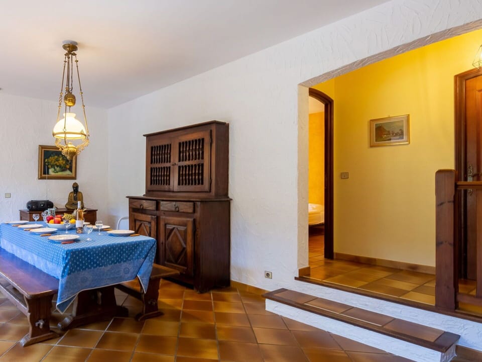 Furniture, Cabinetry, Door, Picture Frame, Wood, Interior Design, Yellow, Table, Flooring, Paint