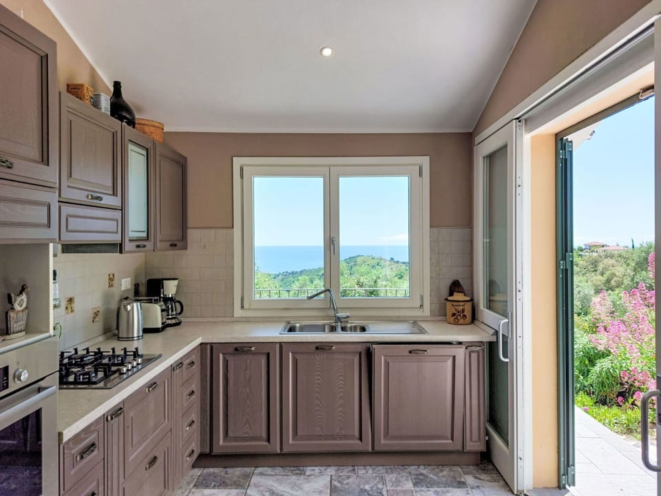 Interior Design, Furniture, Kitchen, Wood, Flooring, Cabinetry, Kitchen Appliance, Home, Countertop, Floor