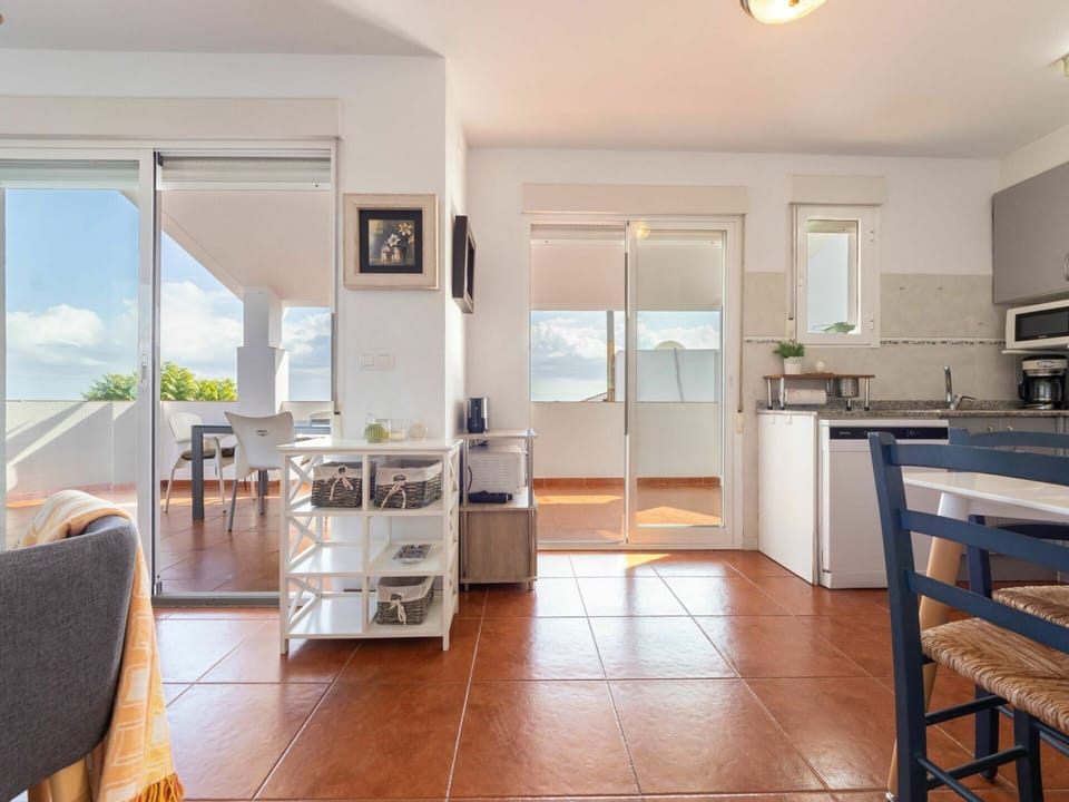 Table, Furniture, Property, Cabinetry, Countertop, Window, Building, Kitchen, Chair, Wood