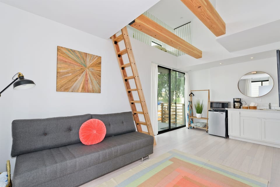 Ground Floor Bedroom w/ Pull Out Couch & Two Twin Mattresses Accessible by ladder