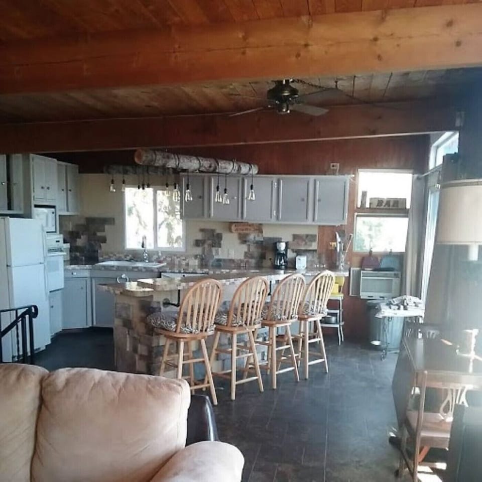 View of kitchen from the living room.  All open!