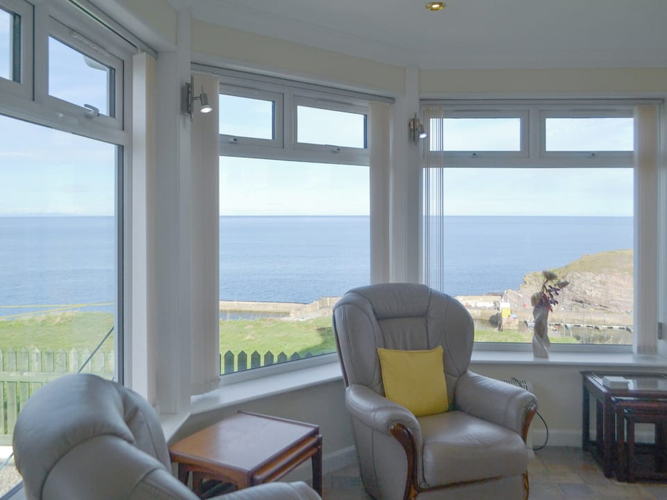 Comfortable seating within the living area | Seabreezes - Scott Holiday Cottages, Portknockie