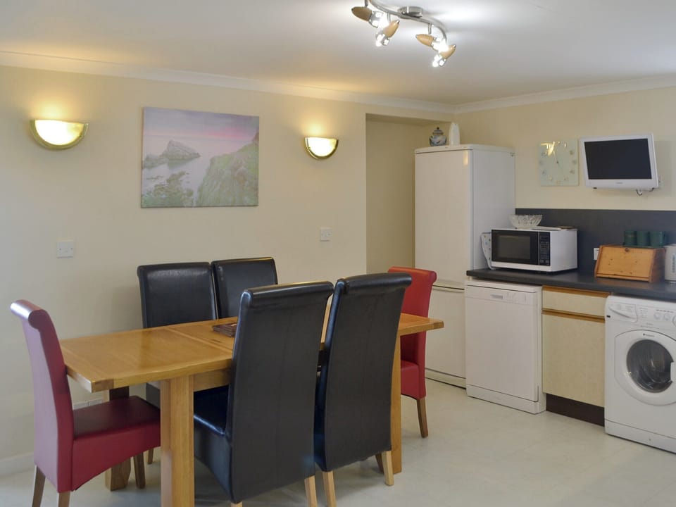 Convenient dining area within the kitchen/diner | Seabreezes - Scott Holiday Cottages, Portknockie